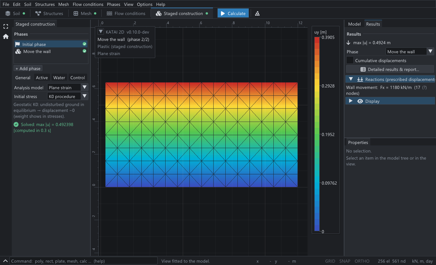 The Rankine wall project opened in the KATAI 2D desktop application after the passive phase: a 12 m by 6 m block with vertical displacement contours in horizontal bands, and the reaction on the wall reported as 1180 kN/m.